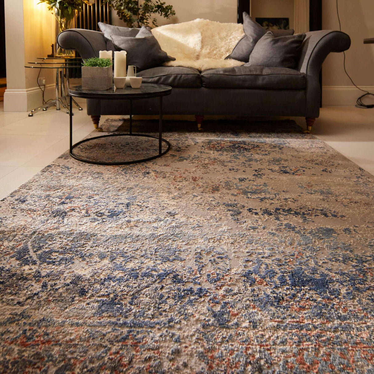 Stylish Abstract Rug in Beige and Blue, enhancing a modern living room with a grey sofa