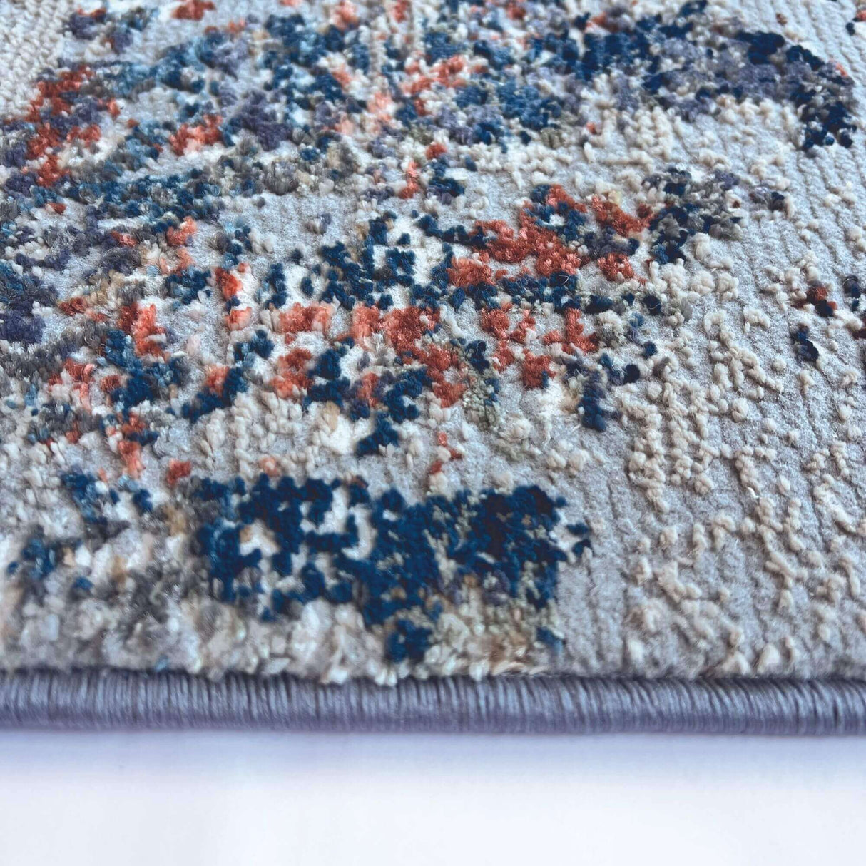 Close-up of an Abstract Rug with vibrant colours and intricate texture, perfect for modern interiors