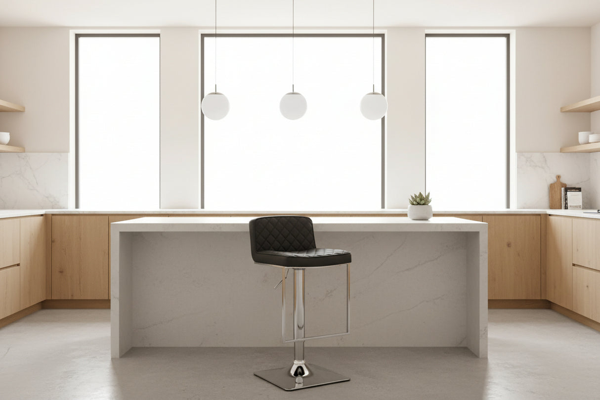Orsina Bar Stool in black with quilted design, perfect for modern kitchen seating