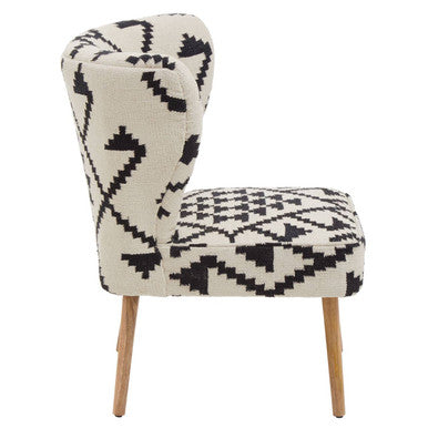 Orsina Berber Style Chair featuring a geometric pattern and wooden legs for stylish accent seating