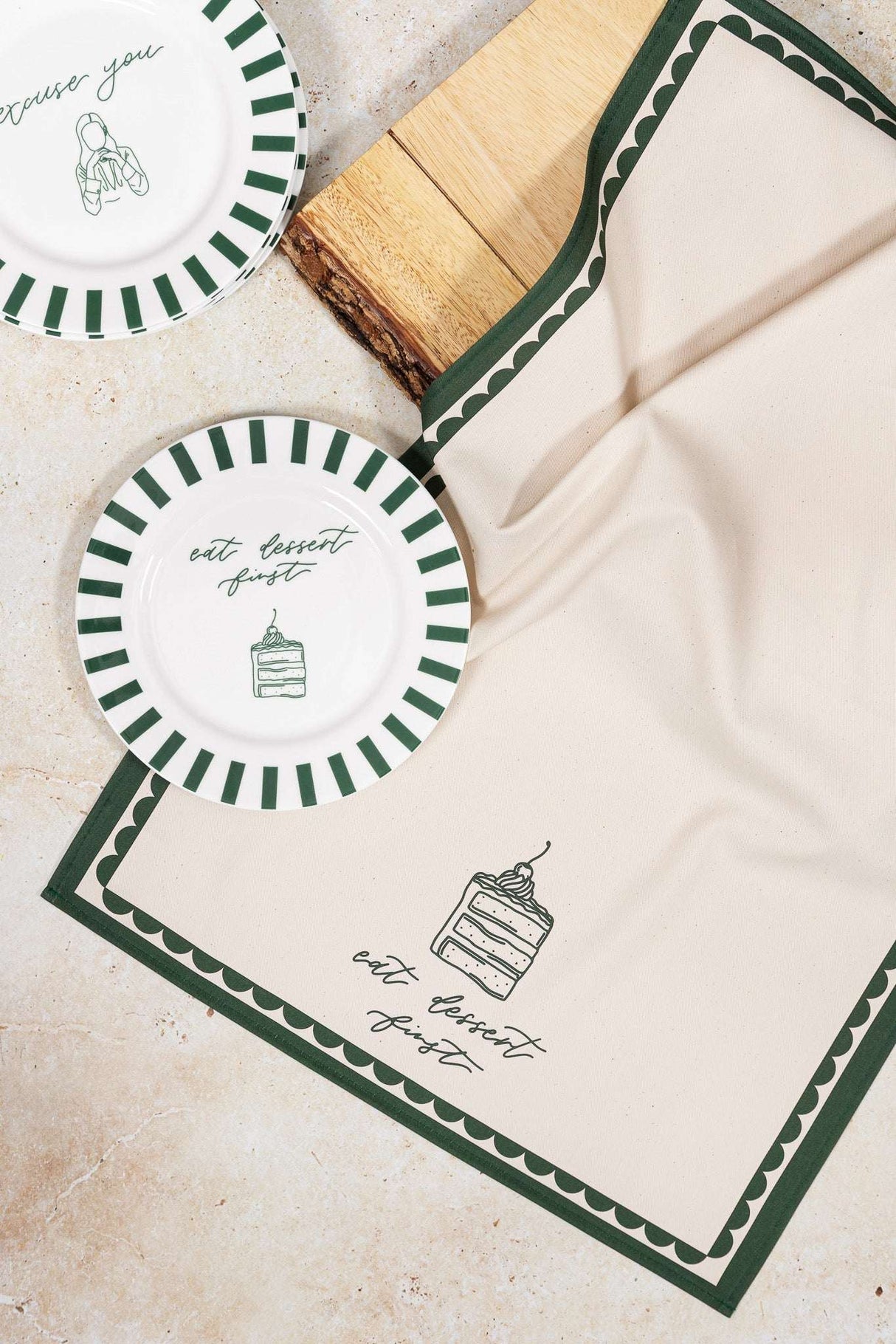 Two Avalon Home UK Bone China Plates with Green Stripes and Dessert Illustration on a Table Setting
