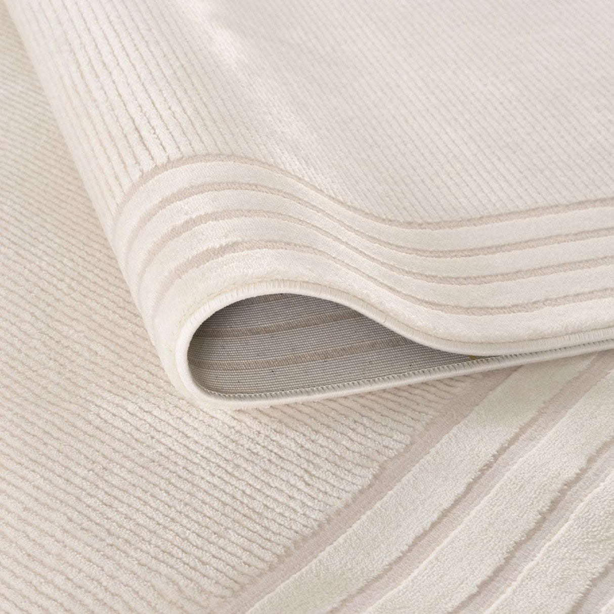 Soft beige Bordered Rug featuring elegant stripes, perfect for enhancing home decor
