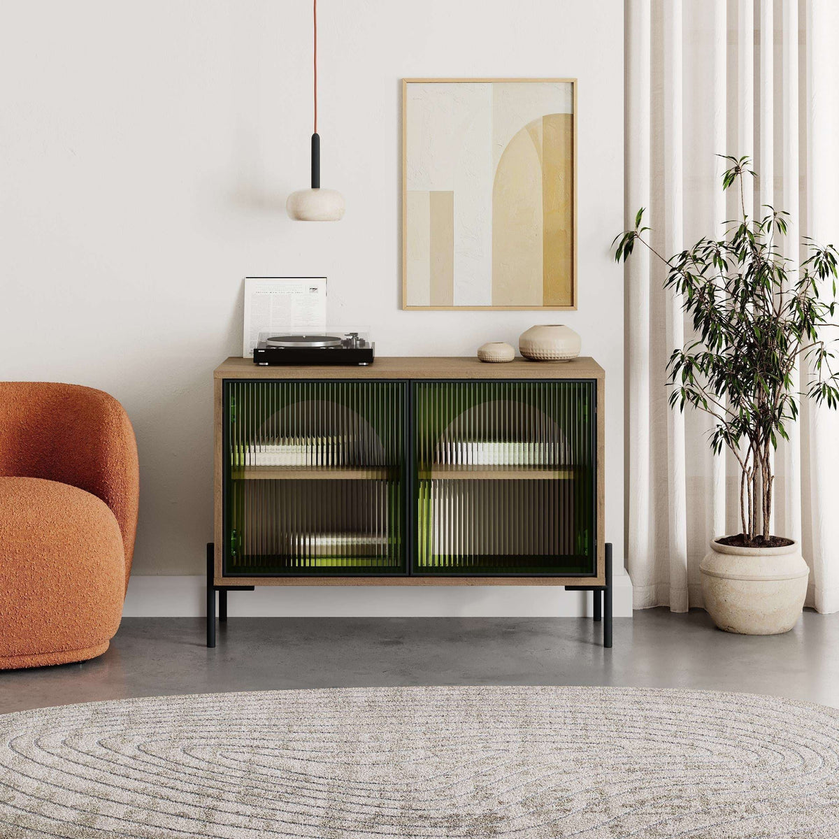 Decortie Buffet Cabinet in green with ribbed doors, stylishly displayed in a modern living room