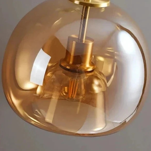 Stylish amber glass ceiling light with a modern design for elegant home decor