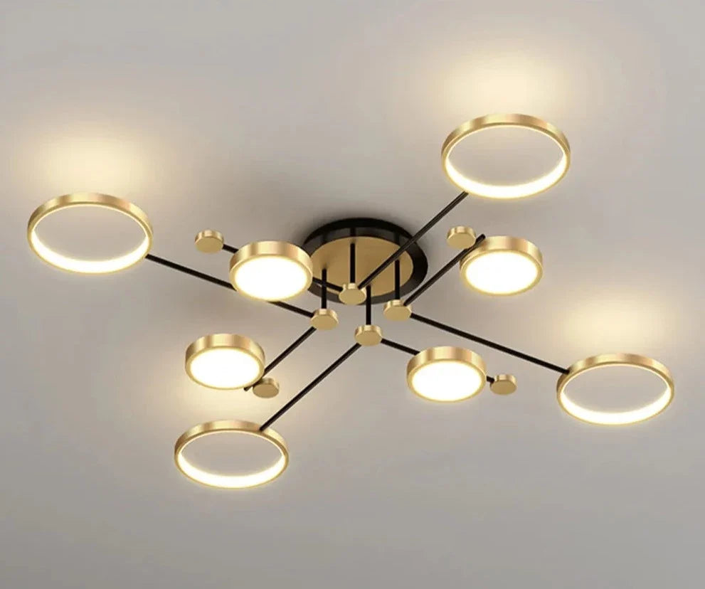 Modern chandelier with seven circular LED lights in a stylish gold finish for elegant interiors
