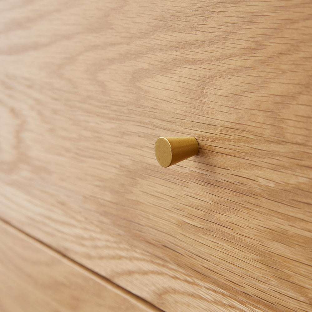 Close-up of a Fishe and Lilly Chest of 3 Drawers featuring a sleek wooden finish and stylish brass handle