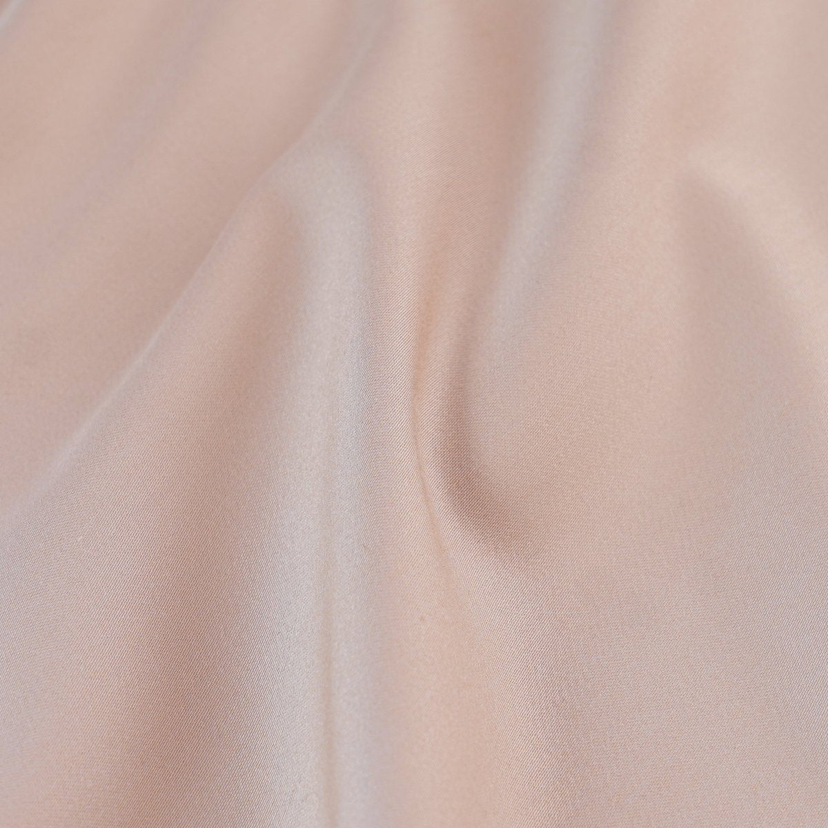Soft peach SHEET STORY fitted sheet made from high-quality fabric for comfortable sleep