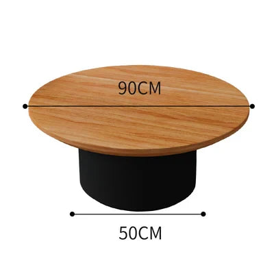 Nisu Home Coffee Table with a 90CM round wooden top and a sleek black base