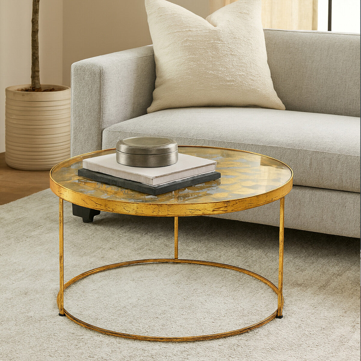 Orsina Gold Coffee Table with Glass Top and Circular Base, perfect for modern living rooms