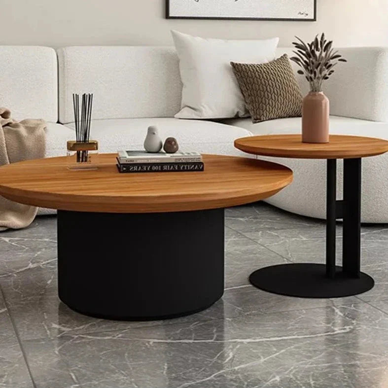 Nisu Home Coffee Table in round design with a wooden top and black base, perfect for modern living rooms