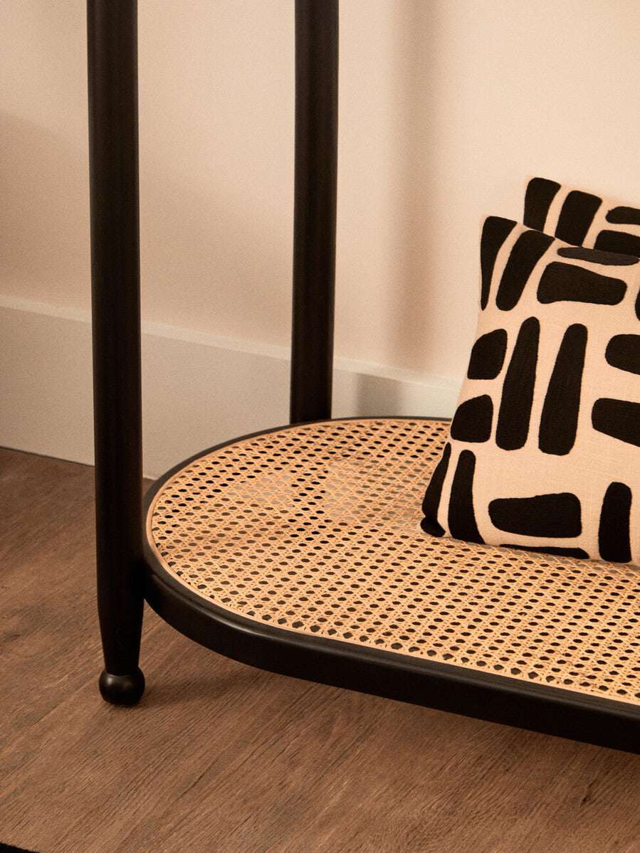 Orsina Console Table with Natural Cane Shelf and Decorative Cushion for Stylish Living Spaces