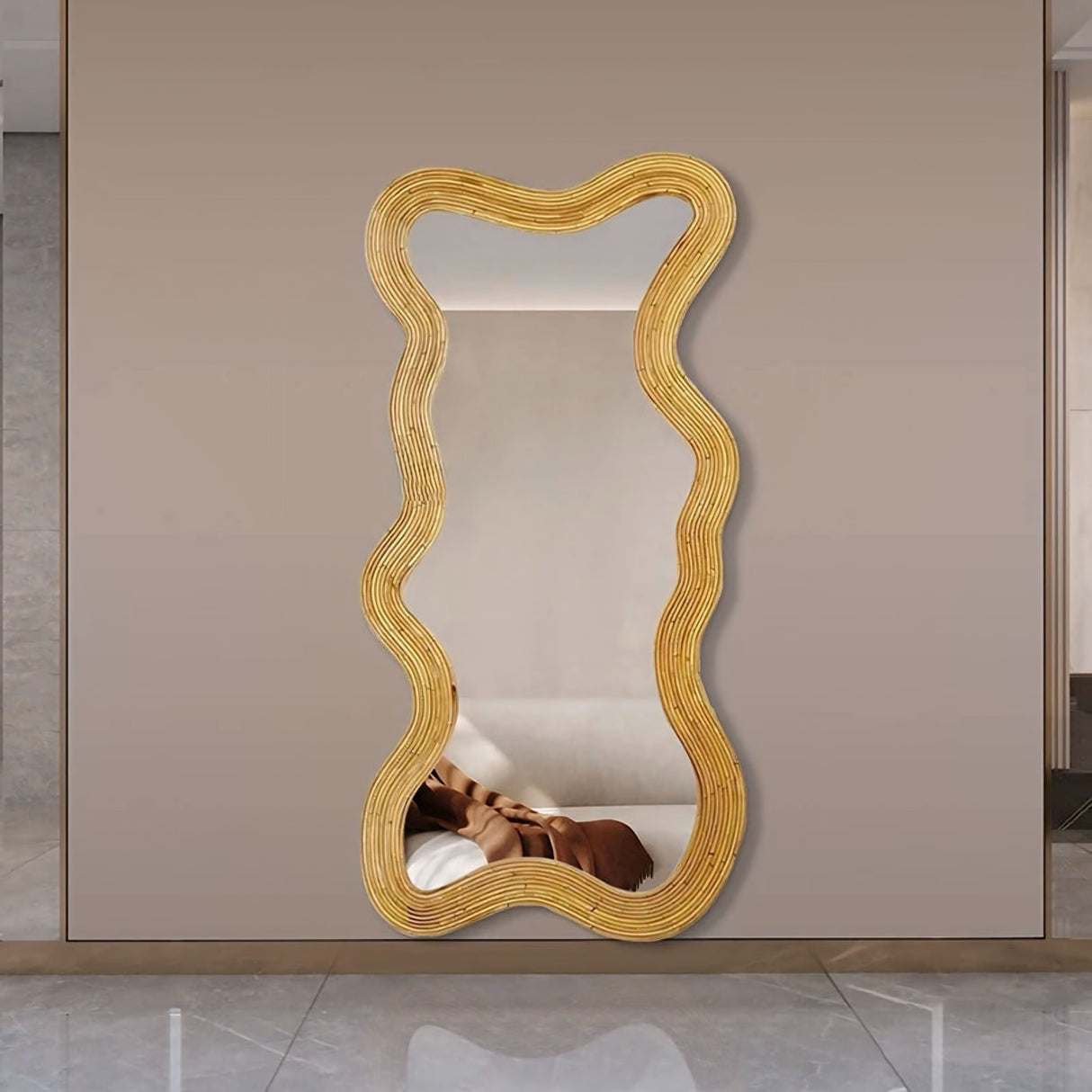 Nisu Home wavy gold Wall Mirror with an elegant design for modern home decor