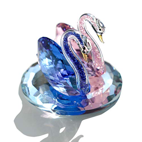 Elegantly crafted crystal swan figurine in pink and blue, perfect for home decor