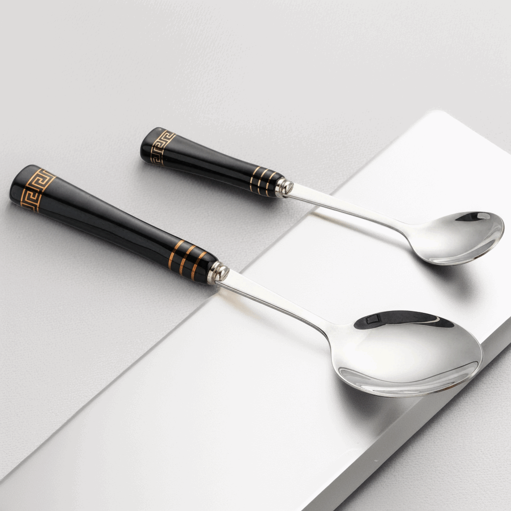 KitchBoom Cutlery Set featuring elegant black handles and shiny stainless steel spoons for stylish dining