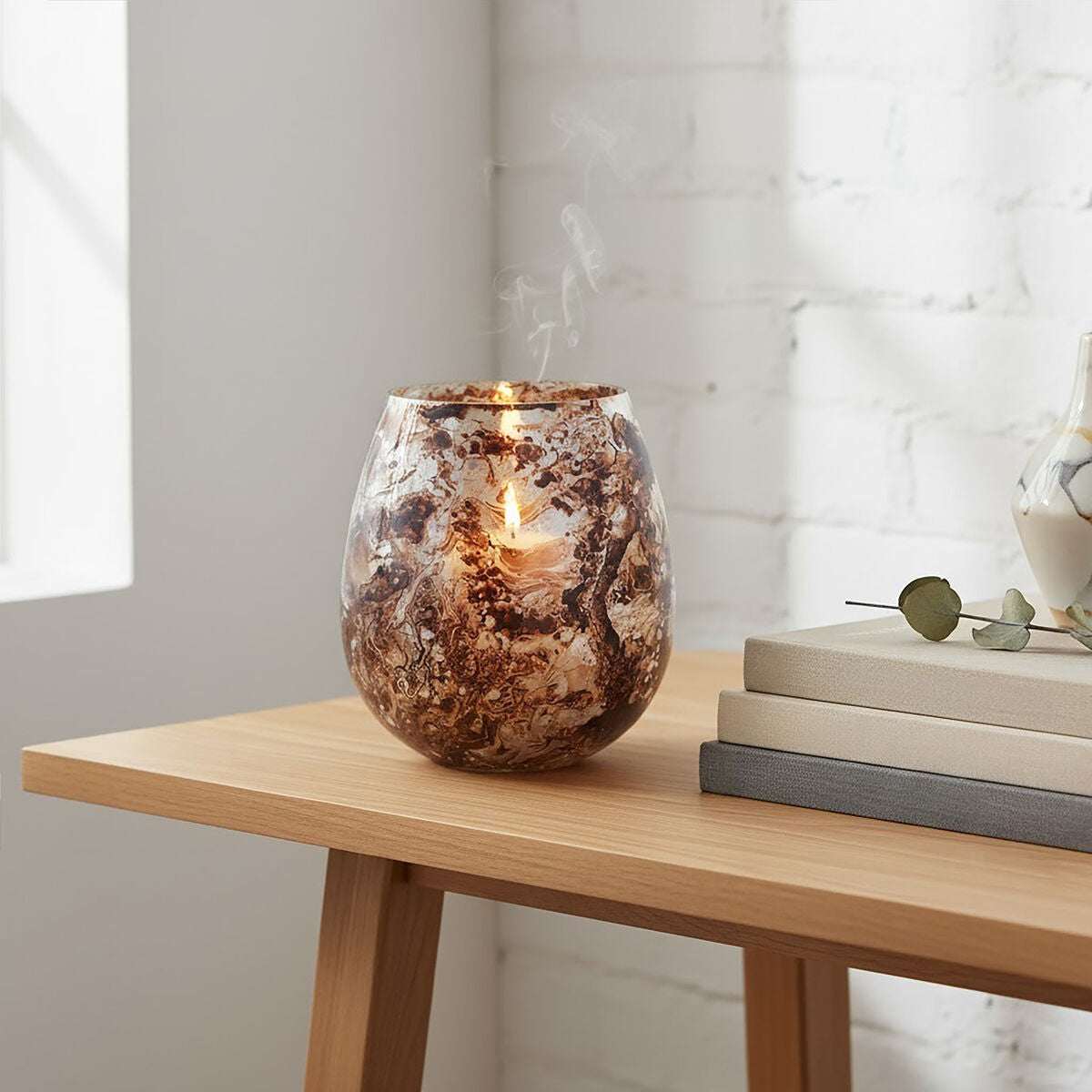 Orsina Candle Holder in a stunning marble design, ideal for elegant home decor