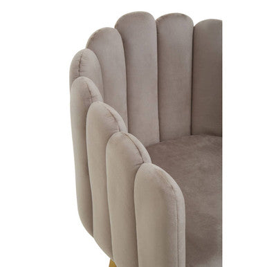 Orsina Dining Chair with a plush, scalloped design and soft upholstery for modern interiors