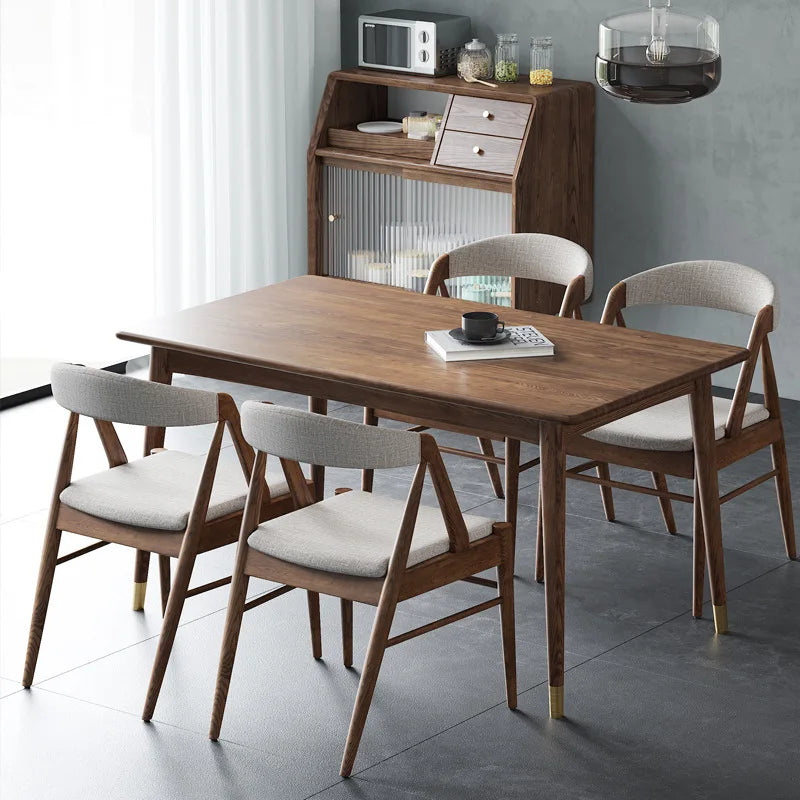 Nisu Home Stylish Dining Chair with Wooden Legs and Soft Fabric Seat in a Modern Dining Room Setting