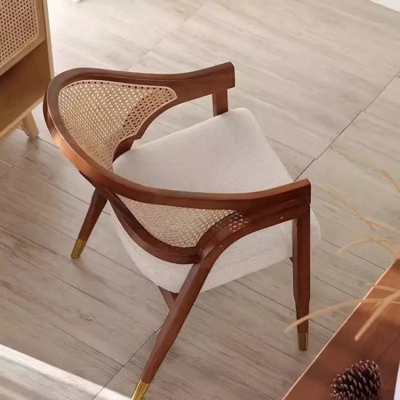 Stylish Nisu Home Dining Chair in wood and rattan with a contemporary design for modern interiors