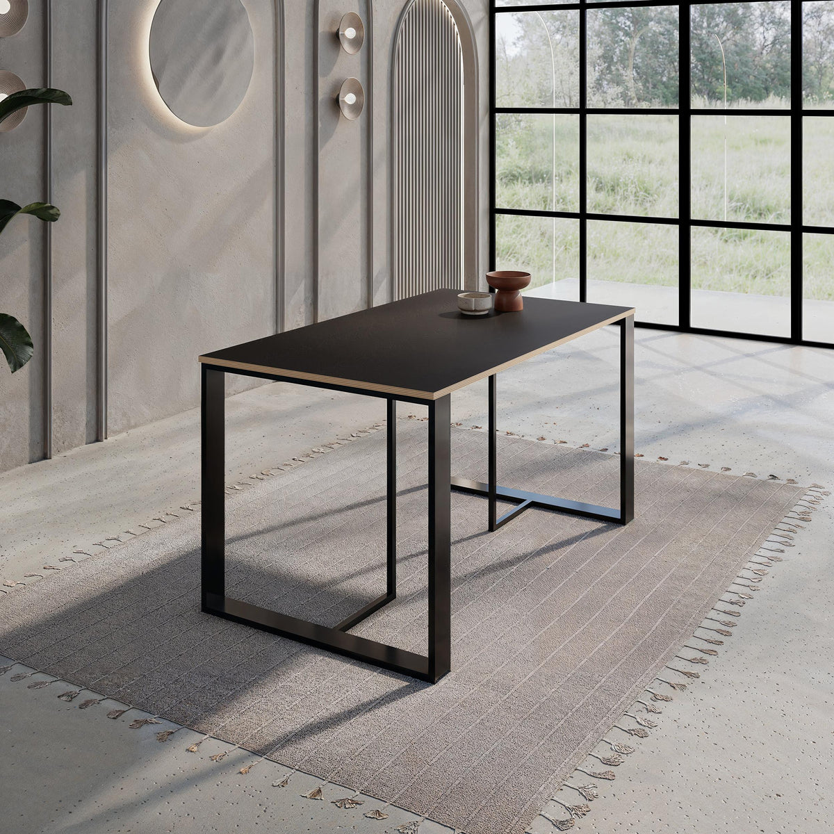 Decortie modern dining table with a sleek black finish in a stylish dining room setting