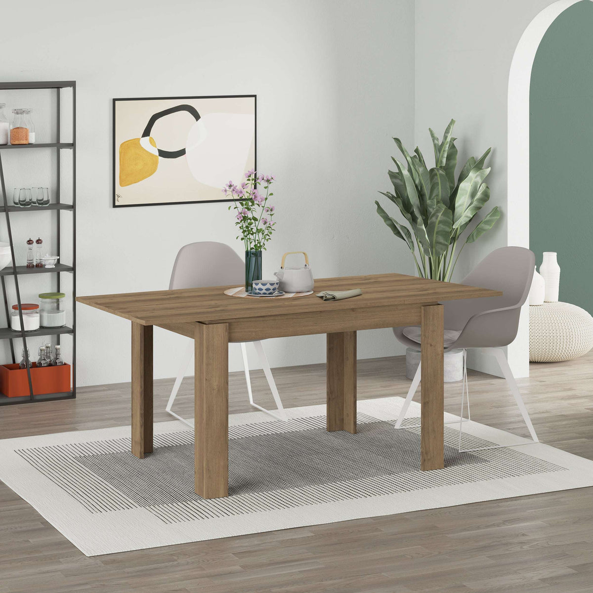 Decortie Dining Table in natural wood finish with stylish design, surrounded by modern chairs and decor