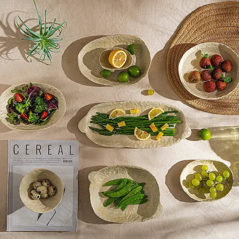 Doshim Tableware set featuring assorted bowls with fresh fruits and vegetables on a stylish table setting