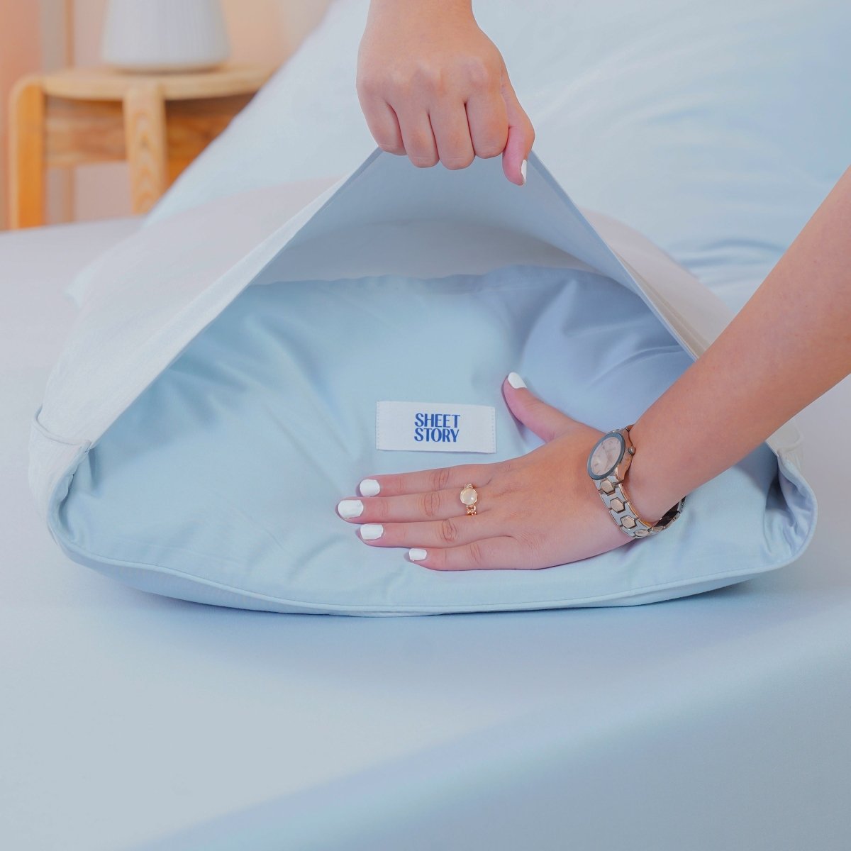 SHEET STORY Duvet Cover Set featuring soft fabric being adjusted on a bed