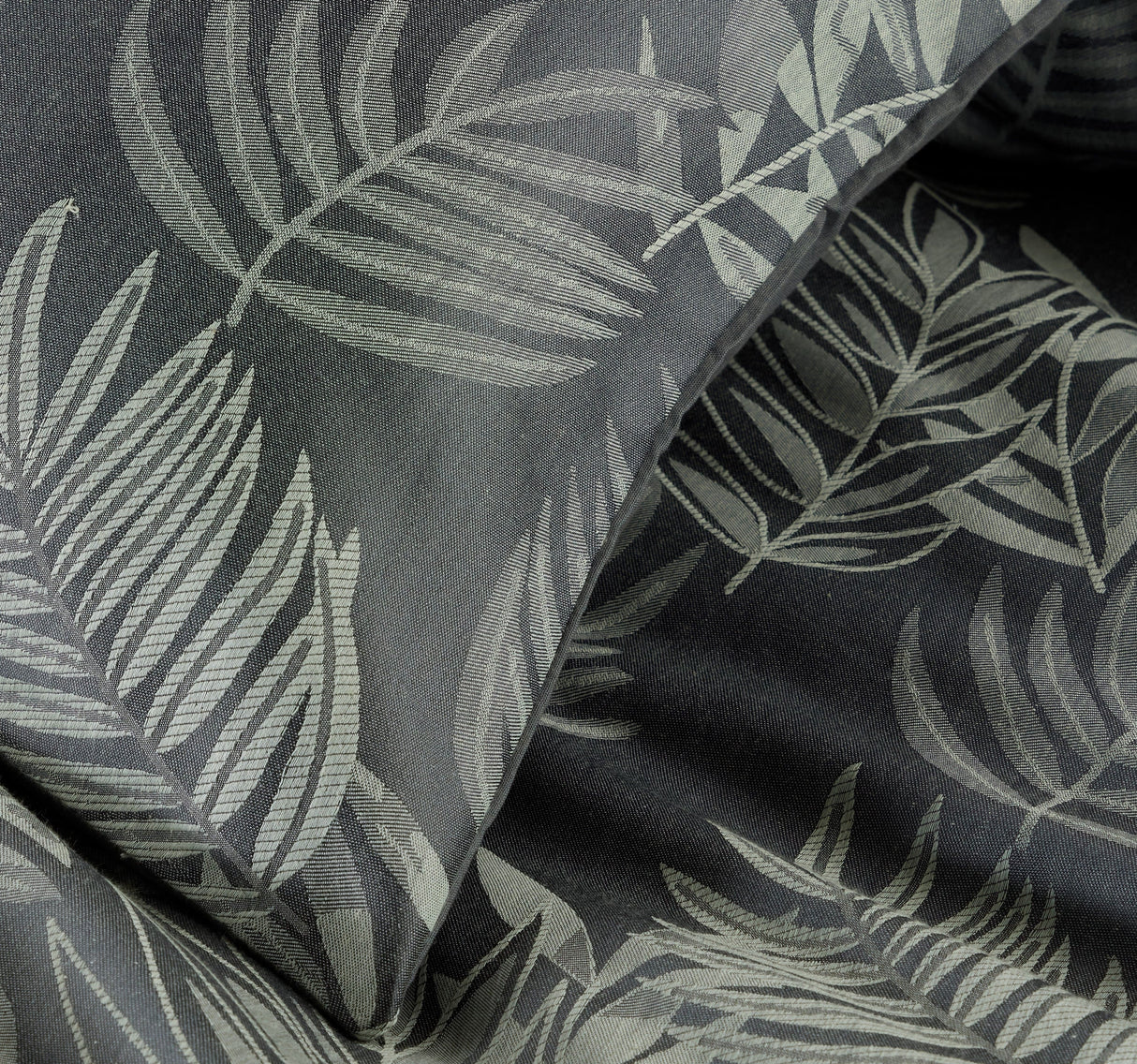 Olivia Rocco Duvet Cover Sets featuring a stylish leaf pattern in muted tones