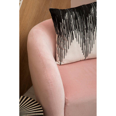 Stylish Orsina Embroidered Cushion with a Modern Black and White Design on a Pink Sofa