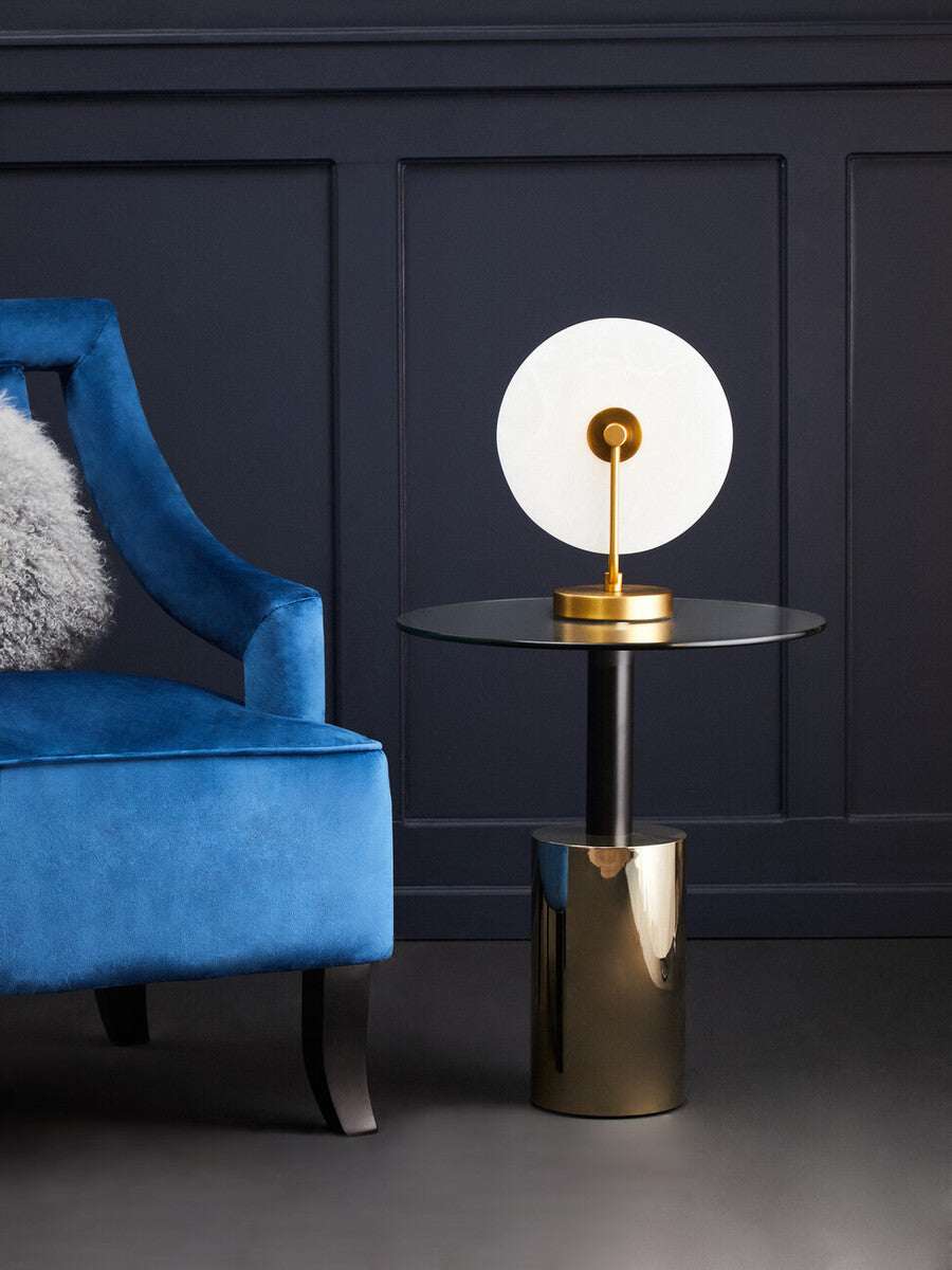 Stylish Orsina End Table with a sleek black surface and a modern lamp for contemporary interiors