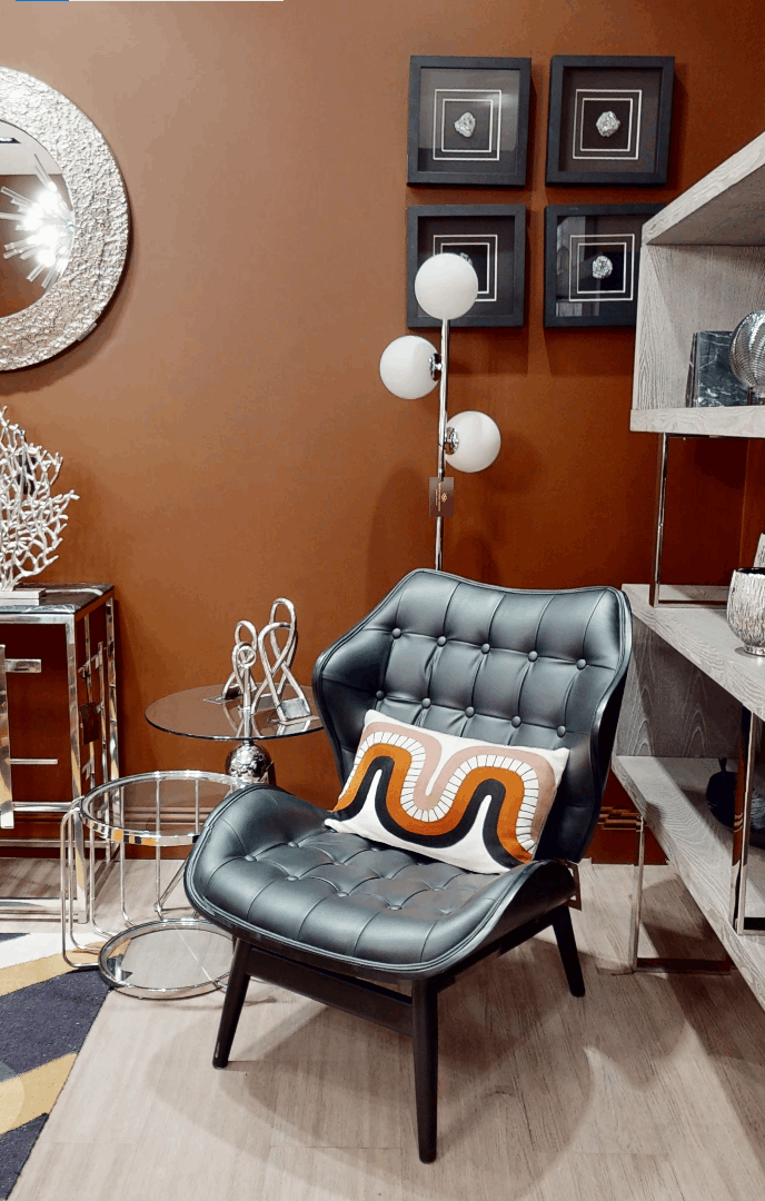 Orsina Floor Lamp with Modern Design beside a Stylish Black Armchair in a Cozy Room