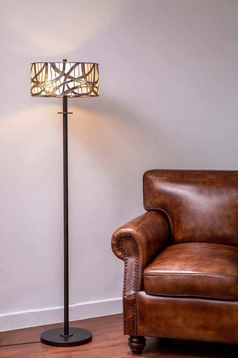Orsina Floor Lamp with Unique Shade Design beside a Brown Leather Sofa in a Comfortable Living Room