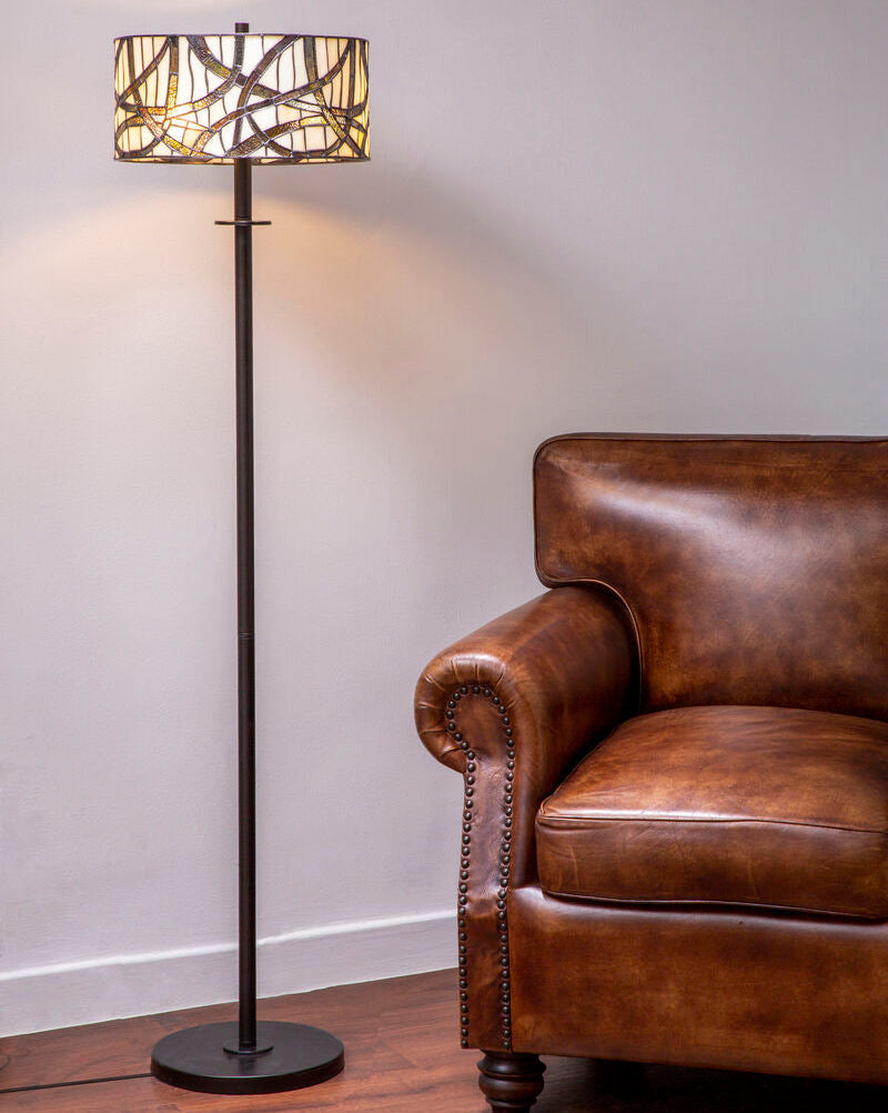 Orsina Floor Lamp with unique patterned shade, perfect for illuminating living spaces