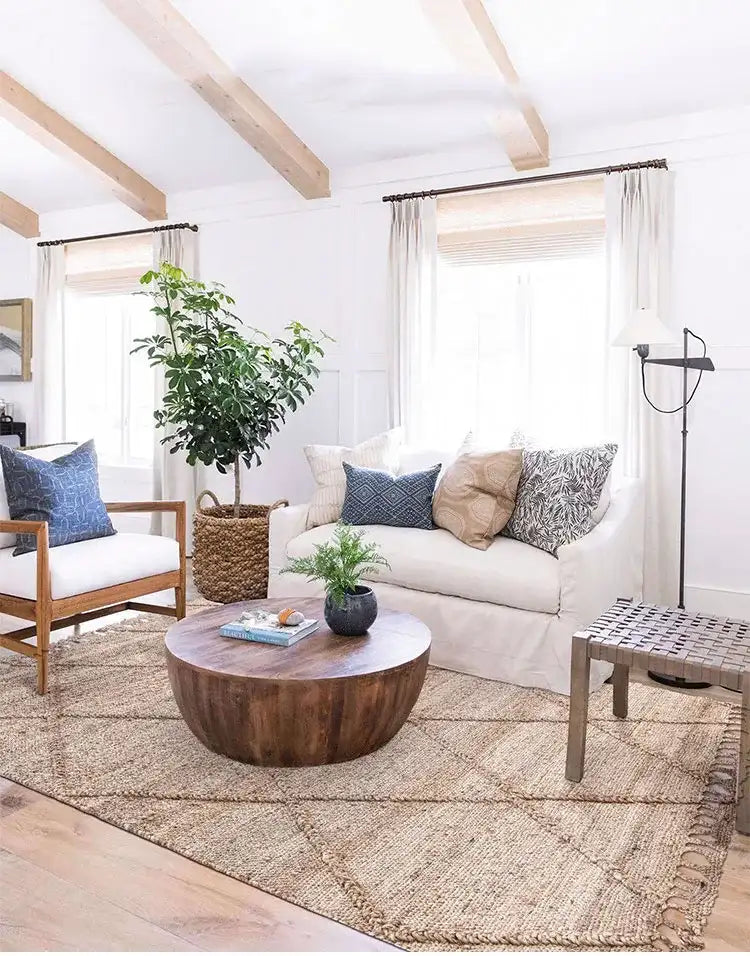 Natural Jute Floor Rug from Nisu Home enhancing a bright living room with wooden furniture
