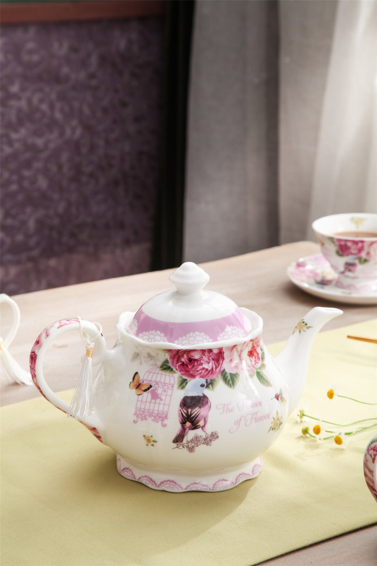 Elegant porcelain milk jug from London Boutique Lifestyle featuring floral designs and a classic shape
