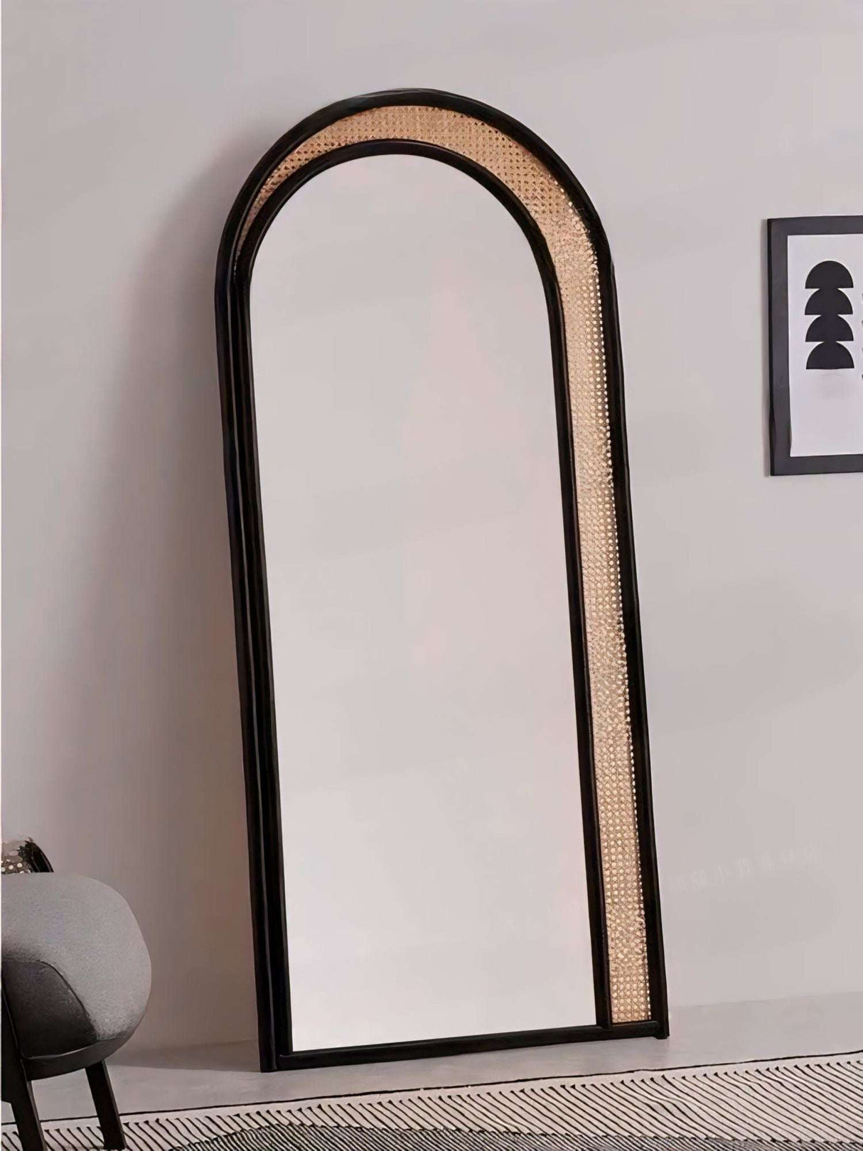 Stylish Nisu Home Mirror with an arched design and natural cane detailing for modern interiors