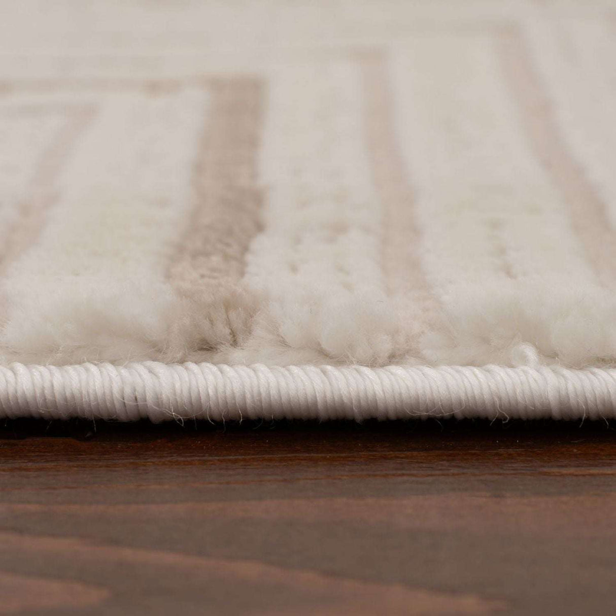 Close-up of a plush Geometric Rug showcasing soft textures and neutral tones for modern decor