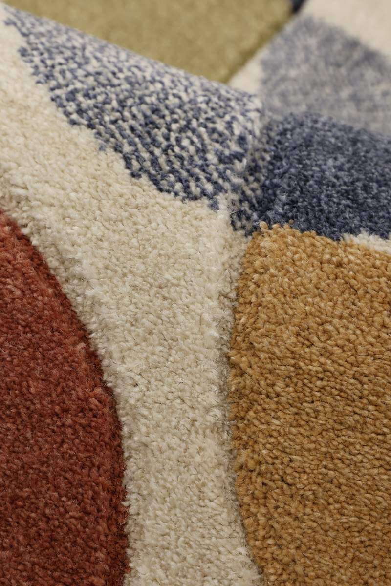 Close-up of a Geometric Rug featuring colourful patterns and soft texture for stylish interiors