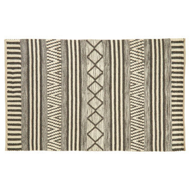 Orsina Geometric Rug featuring bold stripes and patterns in black and cream for modern decor
