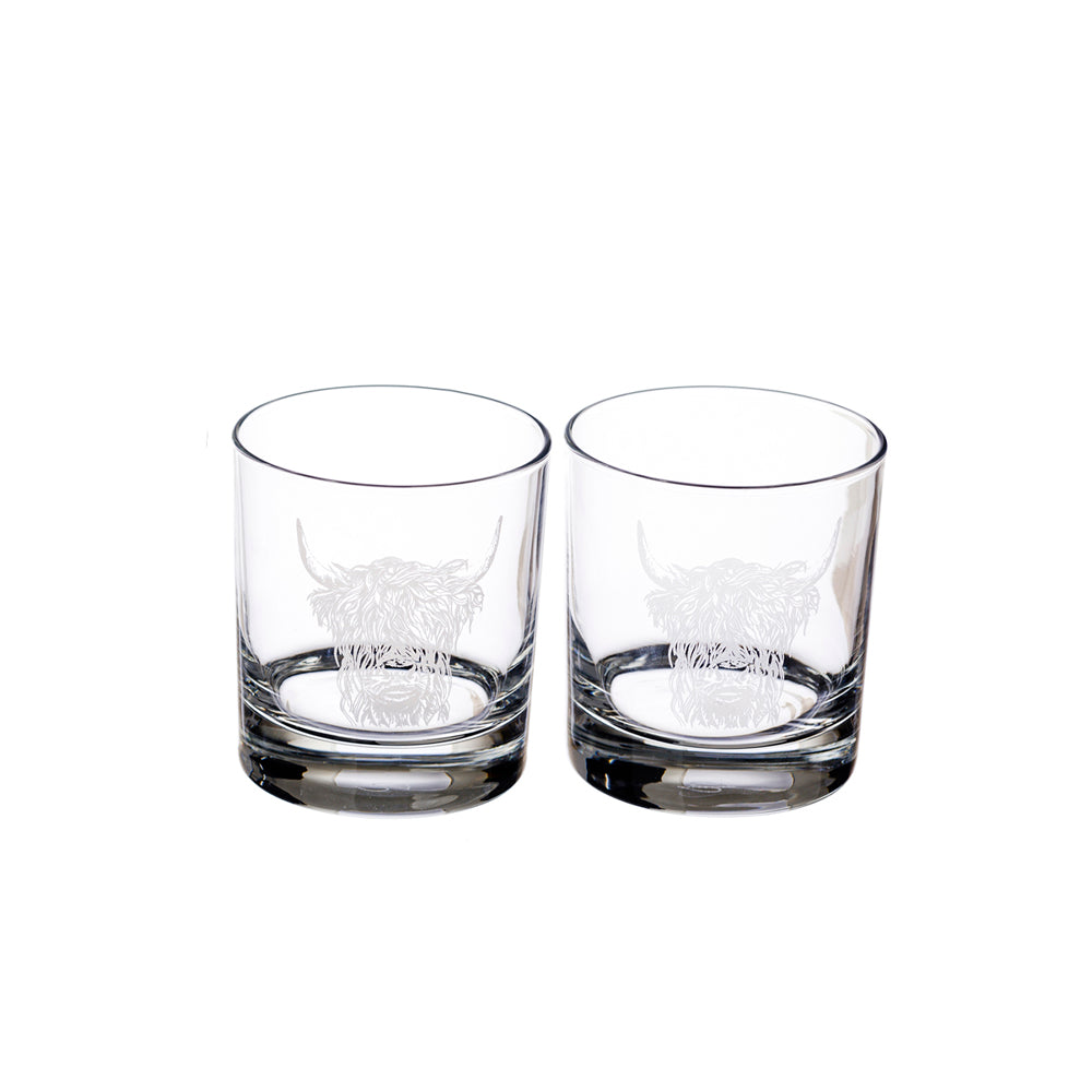 Set of two Selbrae House glass tumblers featuring an elegant Highland cow design