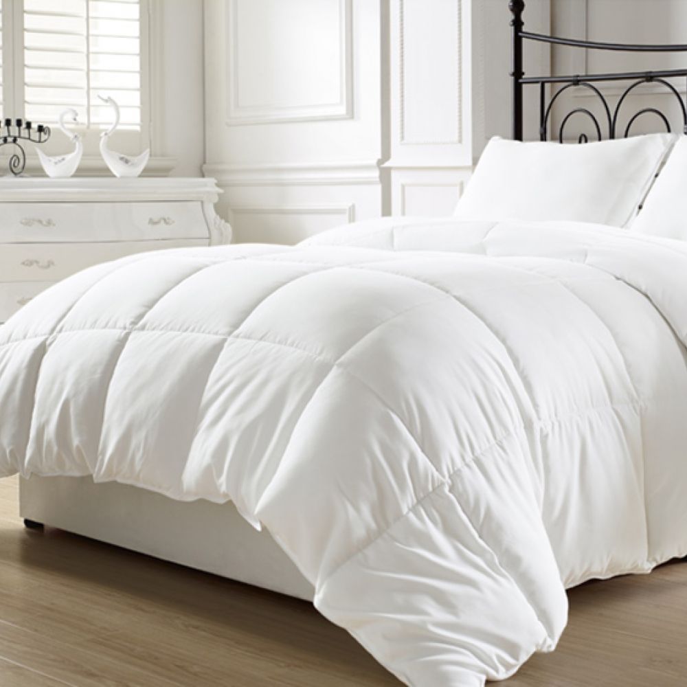 PillowPillow Goose Down Duvet in White on a Bed with Elegant Bedroom Decor