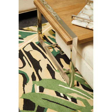 Stylish Green Rug with a Floral Pattern Under a Modern Coffee Table for Contemporary Living Spaces