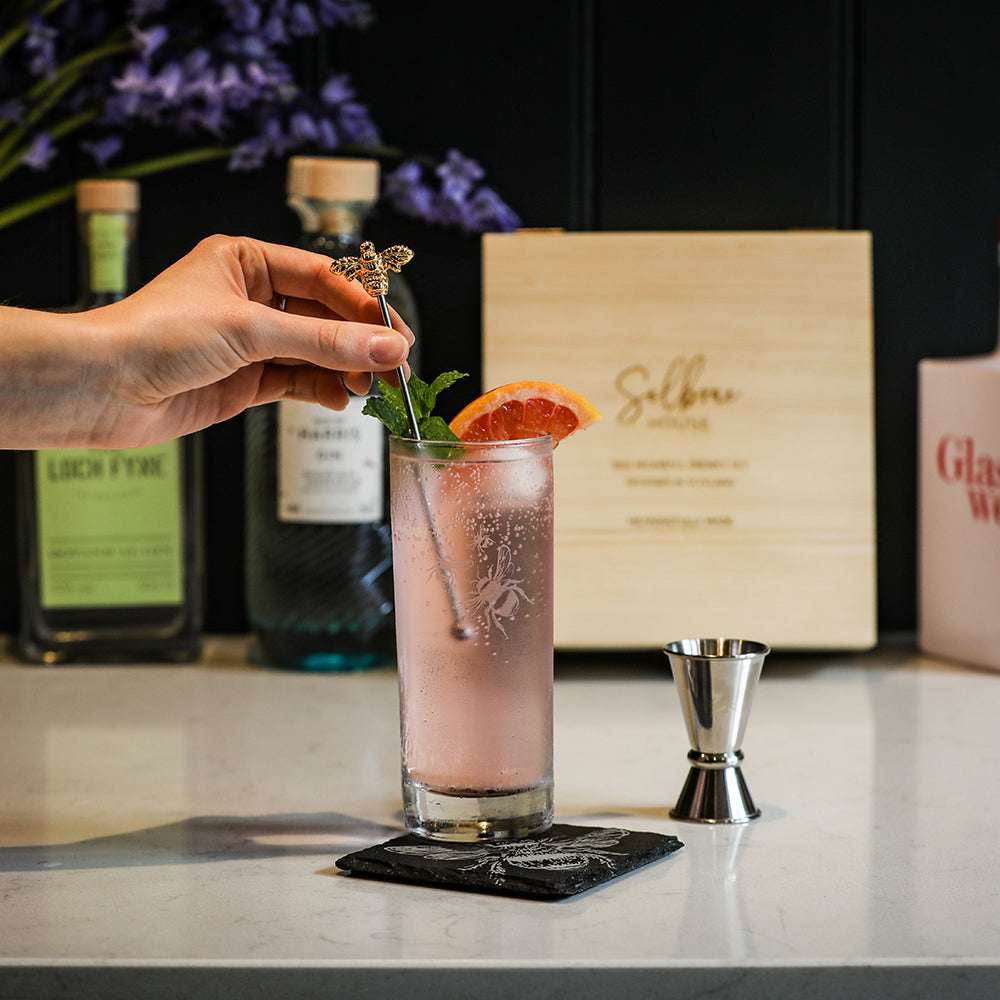 Selbrae House Highball Drinks Set with a refreshing cocktail and stylish accessories on a countertop