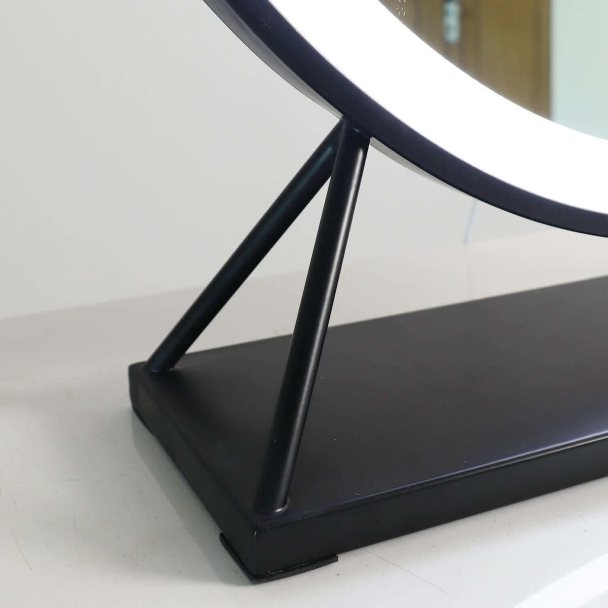 Hollywood Mirror with a sleek black base and bright circular LED lighting for perfect makeup application