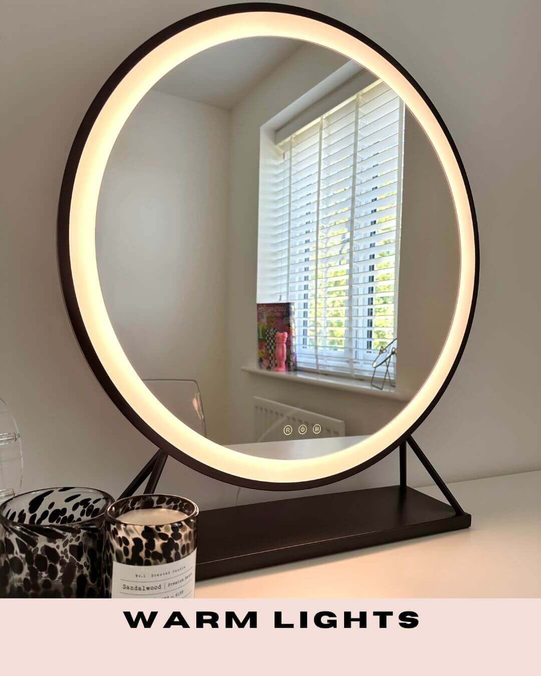 Stylish Hollywood Mirror with warm lights and a sleek round design for elegant decor