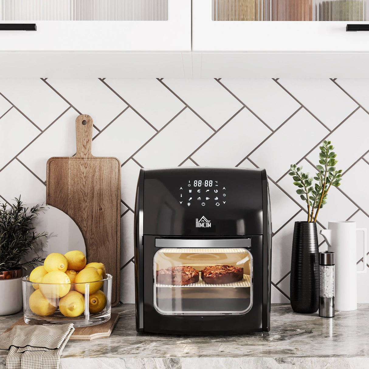 Wise Galleria Air Fryer in black showcasing evenly cooked snacks on a kitchen counter