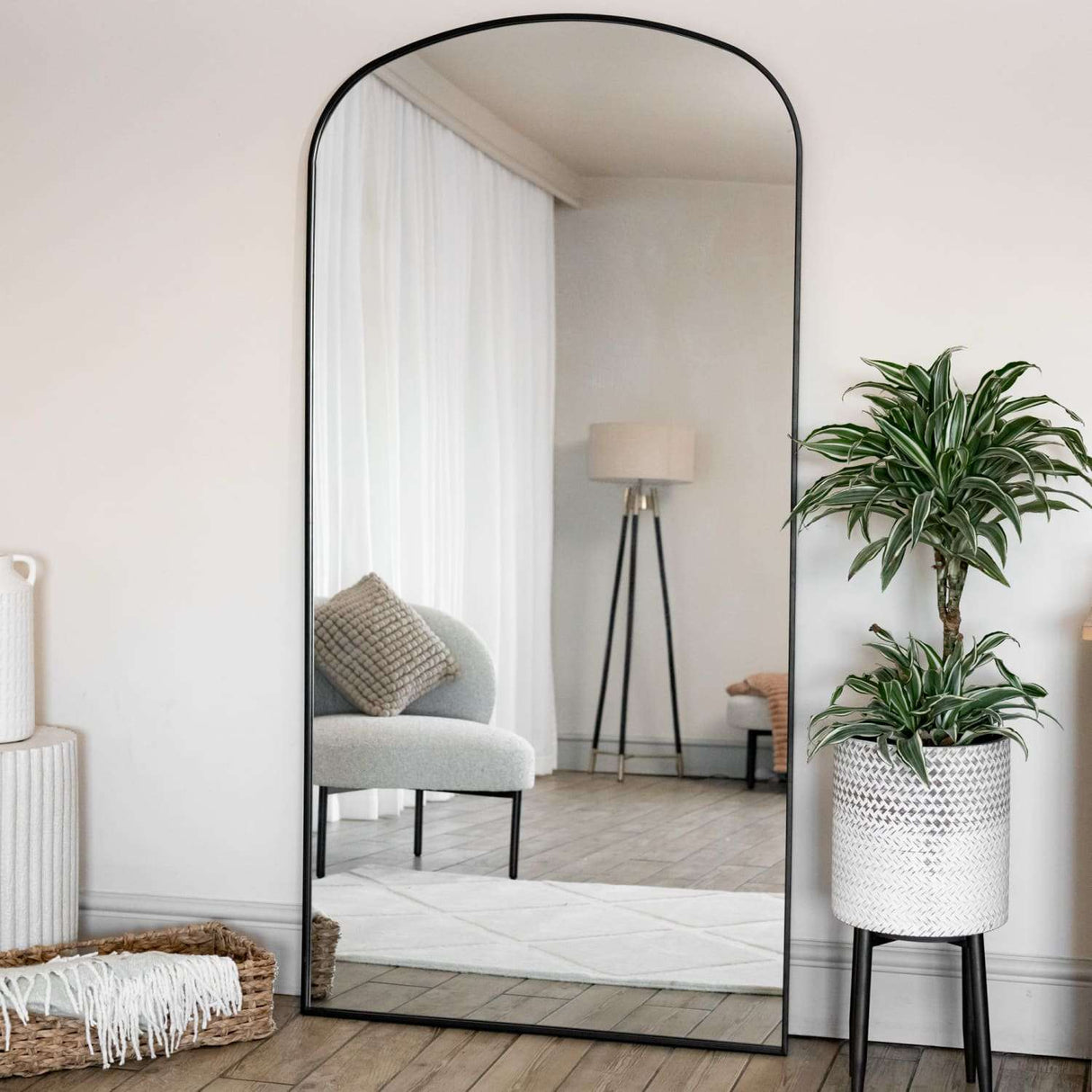 Jobu Home Arch Mirror with a sleek black frame, perfect for modern home decor