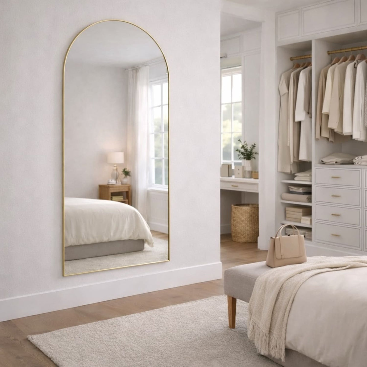 Elegant Arched Mirror with a gold frame, perfect for enhancing bedroom decor and natural light