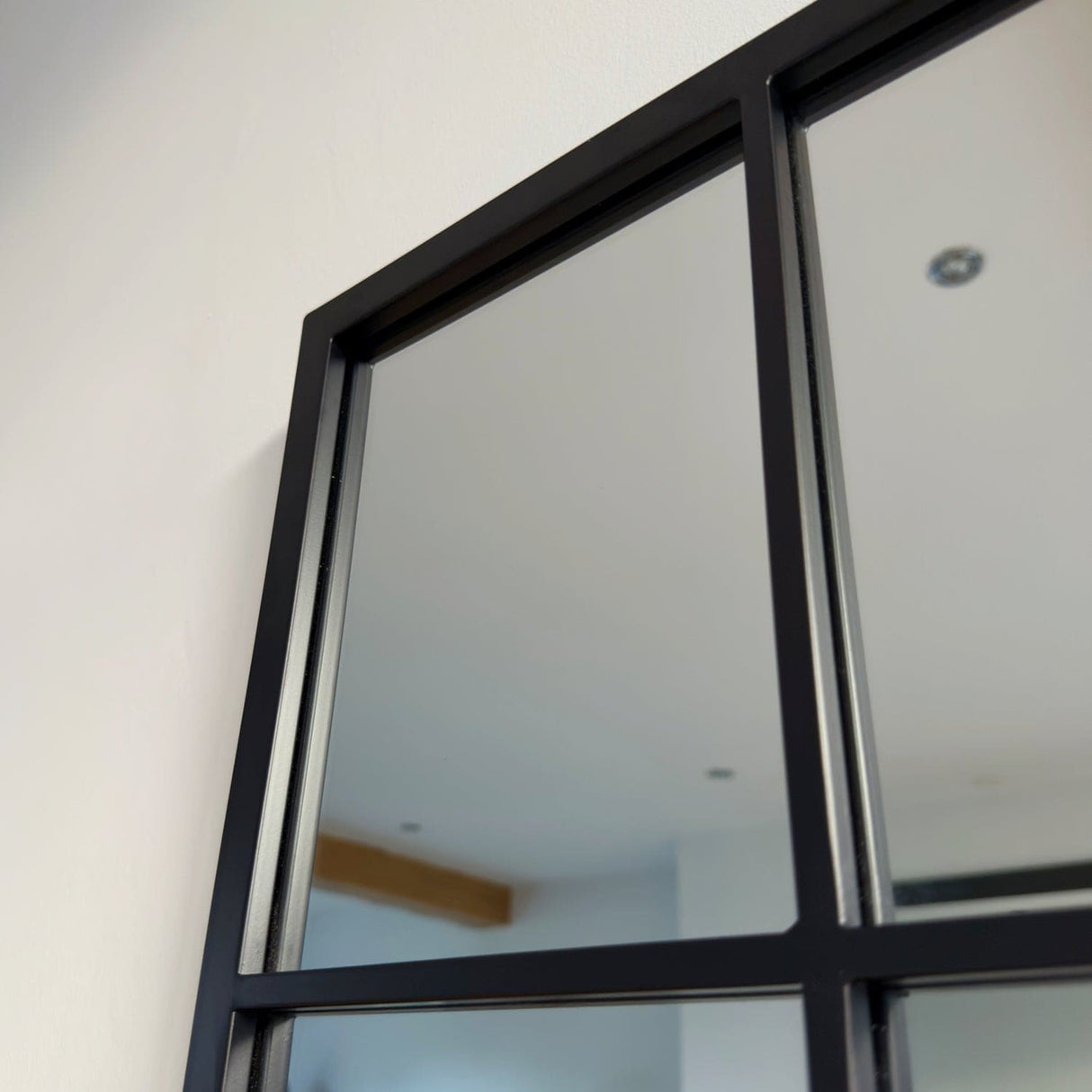 Jobu Home Grid Mirror featuring a sleek black frame and modern design for stylish interiors