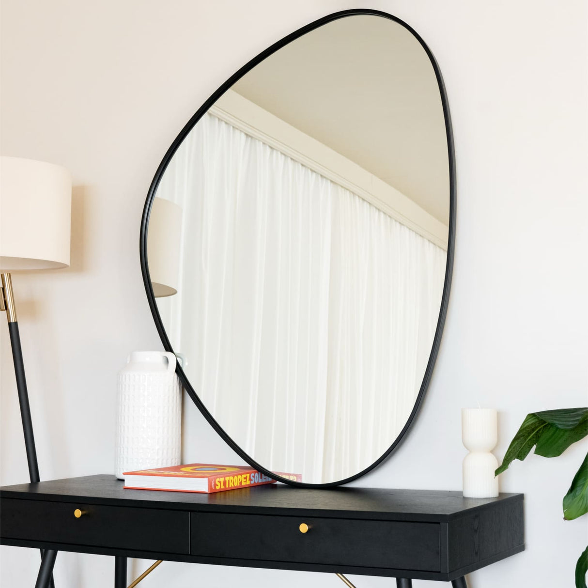 Jobu Home Pebble Mirror with a unique oval shape perfect for modern home decor