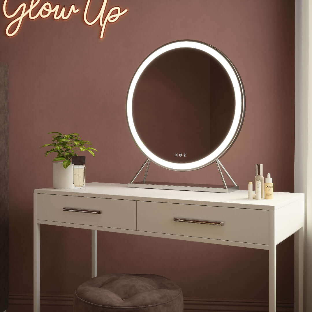 Hollywood Mirrors LED Mirror with Round Design and Adjustable Brightness on a Stylish Dressing Table